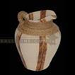 balishine This decorative pot is produced in Indonesia made from clay with white sand finishing and banana leaves .