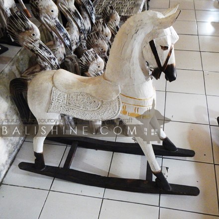 Balishine: Your natural source of indonesian handicraft presents in its Home Decor collection the Handmade Wooden Rocking Horse:12TRE38700:This vintage wooden rocking horse looks like a memento from an ancient fairytale. Hand-carved from sustainable albasia wood by Indonesian artisans, this large rocking horse has elaborately engraved to muse a very expressive face, along with a finely-detailed mane and saddle with beautiful carvings.  