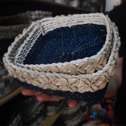 Balishine: Your natural source of indonesian handicraft presents in its Home Decor collection the Shell Cowrie Trimmed Seagrass Square Basket:12JEN368094:Handwoven natural seagrass baskets set of 2 pcs?with 3 rows of cowrie shells around the top of each basket. Black base with natural contrast. Other colors possible please contact us.?  Made from seagrass, ecofriendly and biodegradable.