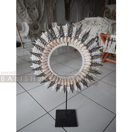 Balishine: Your natural source of indonesian handicraft presents in its Home Decor collection the Toba Tribal Shell Necklace Decorative on Stand:12NUS878010:For ancient Indonesians, jewelry as such was an essential part of ceremonial dress.  Jewelry could be worn as a symbol of power and standing or to protect the wearer from spiritual harm. The shell and feather necklace makes for a spectacular eye-catching home decor piece.  Each necklace is one-of-a-kind and will no doubt make a statement in your home.  This beautifully?crafted necklace?is?handmade in Indonesia.