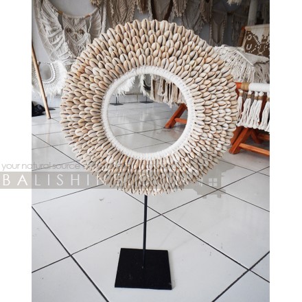 Balishine: Your natural source of indonesian handicraft presents in its Home Decor collection the Tribal Shell Necklace Decorative on Stand:12NUS878002:For ancient Indonesians, jewelry as such was an essential part of ceremonial dress.  Jewelry could be worn as a symbol of power and standing or to protect the wearer from spiritual harm. The shell and feather necklace makes for a spectacular eye-catching home decor piece.  Each necklace is one-of-a-kind and will no doubt make a statement in your home.  This beautifully?crafted necklace?is?handmade in Indonesia.
