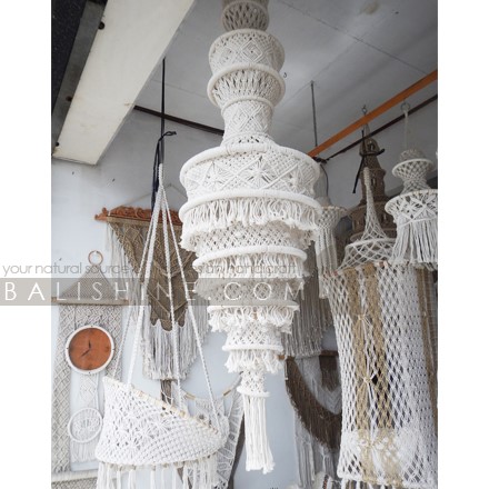 Balishine: Your natural source of indonesian handicraft presents in its Home Decor collection the Fiber Macrame Lampshade:13NUS867962:A unique macrame chandelier design. With this macrame hanging lamp shade you'll instantly add a bohemian vibe to your room and it will really warm up a space. It is great for a bedroom, living area, boho wedding background or anywhere where you'd like to bring some texture and interest to your walls.  Handmade, natural, 100% cotton. Available in white or light brown color.