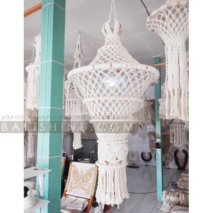 Balishine: Your natural source of indonesian handicraft presents in its Home Decor collection the Quito Fiber Macrame Lampshade:13NUS867989:A unique macrame chandelier design. With this macrame hanging lamp shade you'll instantly add a bohemian vibe to your room and it will really warm up a space. It is great for a bedroom, living area, boho wedding background or anywhere where you'd like to bring some texture and interest to your walls.  Handmade, natural, 100% cotton. Available in white or light brown color.