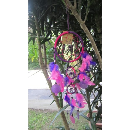 Balishine: Your natural source of indonesian handicraft presents in its Home Decor collection the Dream Catcher:17APA466525:This dream catcher is a handicraft of Bali made from string and feather with shell.  Same as picture