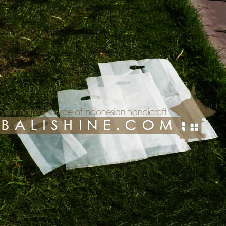 Balishine: Your natural source of indonesian handicraft presents in its The shop accessories collection the Plastic Bag:316BIN5005:This plastic bag with die-cut handle, 0,6 microns is produced in Indonesia. Minimum order 500 pieces.  Translucent white or orange color