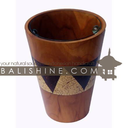 Balishine: Your natural source of indonesian handicraft presents in its Tableware collection the Bottle Holder:633KAL482:This bottle holder is produced in Bali made from teak wood with the skin of coconut shell mosaic with inside a handmade glass.  