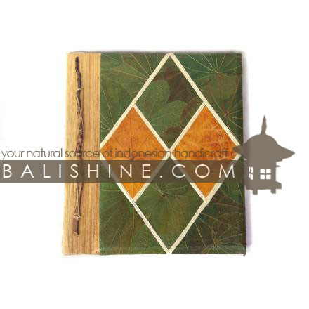 Balishine: Your natural source of indonesian handicraft presents in its Various collection the Photos Album:45BIP18905:This photo album  is produced in Bali made from 7 different  exotic leaf for the cover and 10 pages with recycle paper inside.  Inside maximum 40 photos 15X10 cm.